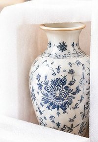 Blue and white vase in foam